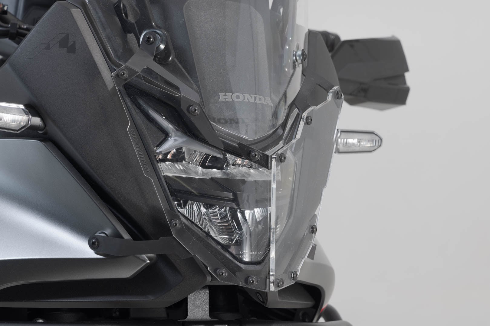 [LPS.01.070.10000/B] Griglia di protezione per fari Honda XL750 Transalp (22-24).