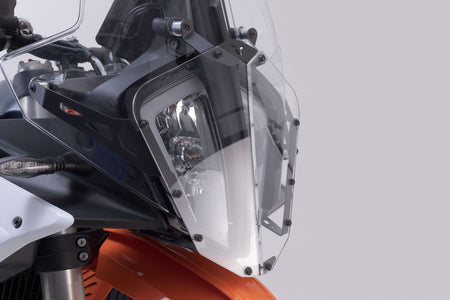 [LPS.04.918.10000/B] Griglia di protezione per fari Staffa con pannello. KTM 890 Adventure R (22-).