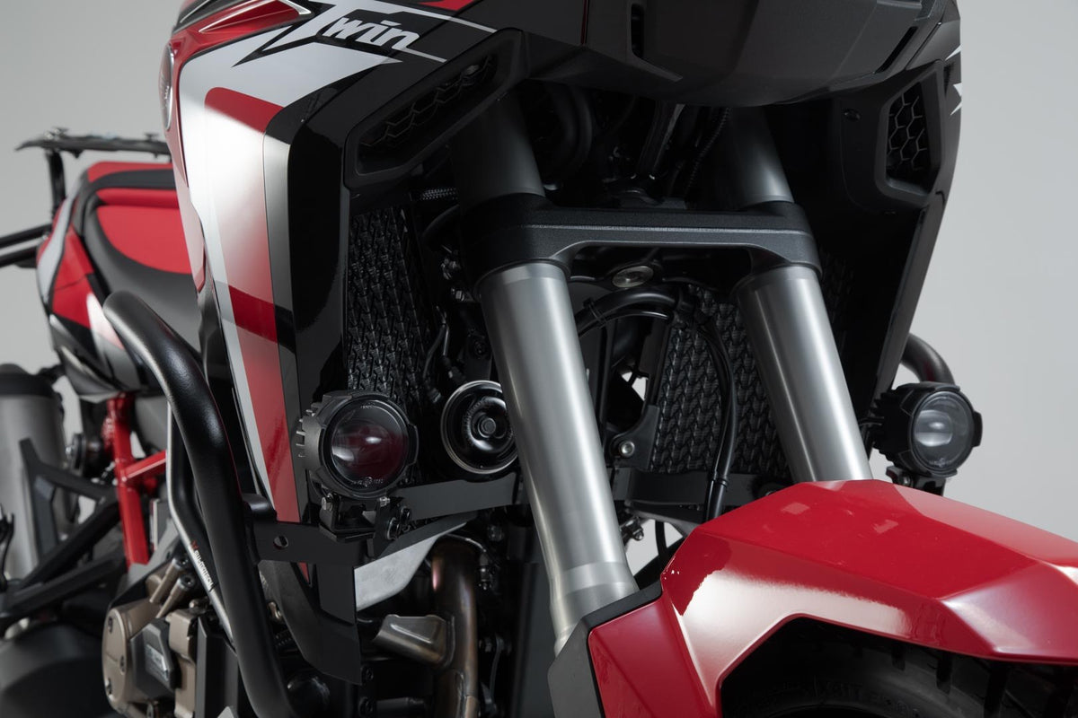 [NSW.01.622.10102/B] Supporto per faretti Nero. Honda CRF1000L/CRF1100L con prot. laterale.
