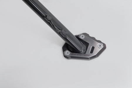 [STS.04.521.10000] Base maggiorata per cavalletto laterale Nero/Argento. Modelli KTM / Husqvarna.